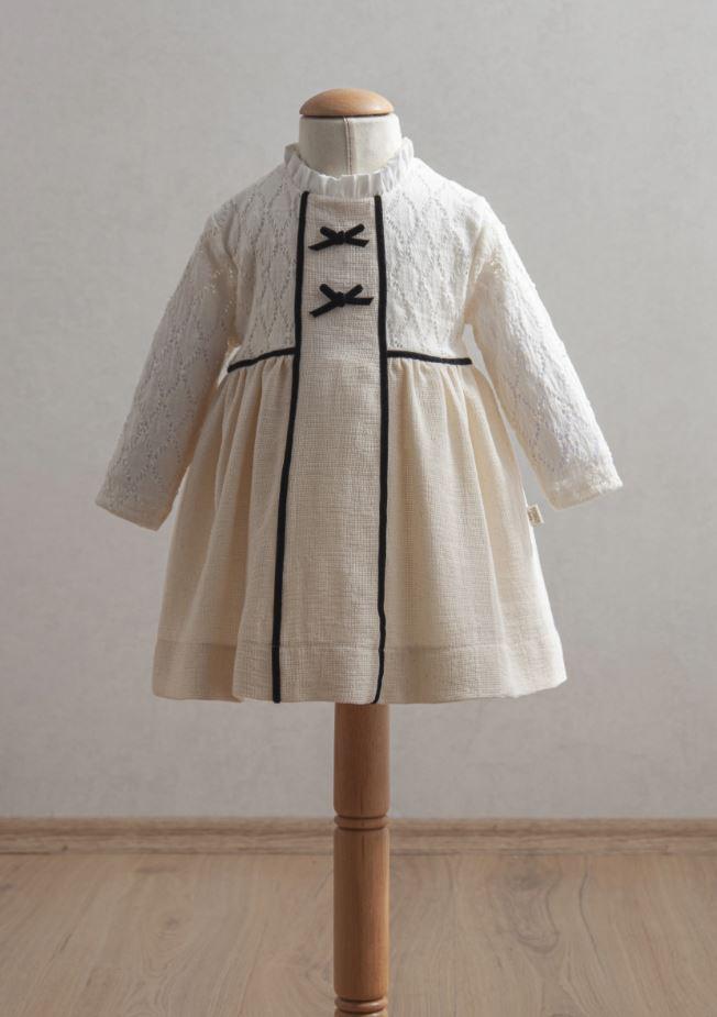 Girl Baby Off-White Dress with Black Ribbon Detail, Peter Pan Collar, and Lace Sleeves (6-36 Months)