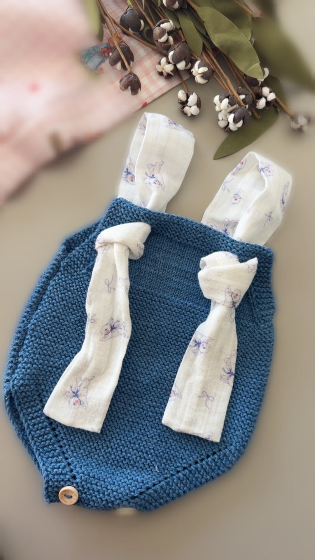 Hand-Knit Baby Romper with Muslin Tie Straps