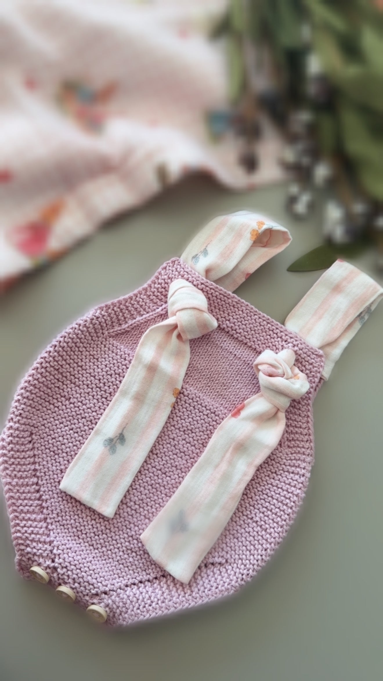 Hand-Knit Baby Romper with Muslin Tie Straps