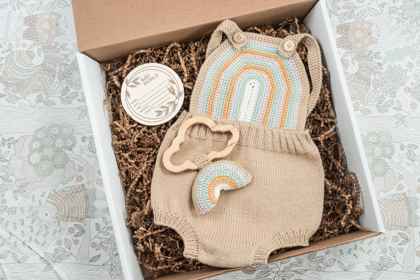 Crochet Baby Romper with Rainbow Rattle: Boho Knit Outfit