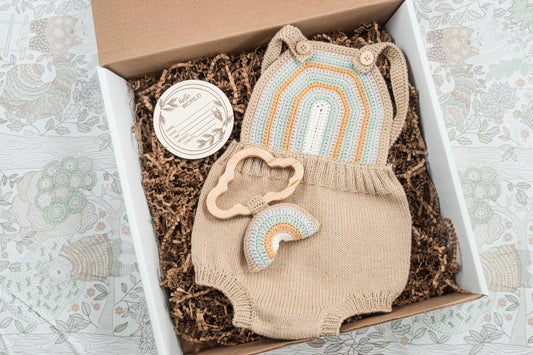 Crochet Baby Romper with Rainbow Rattle: Boho Knit Outfit