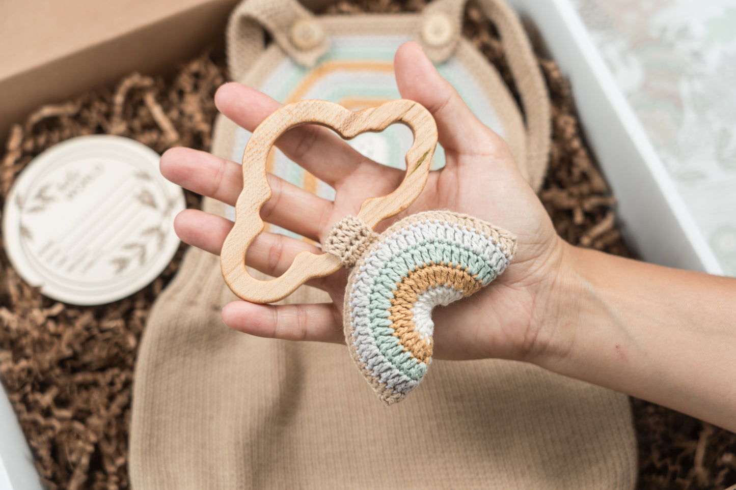 Crochet Baby Romper with Rainbow Rattle: Boho Knit Outfit